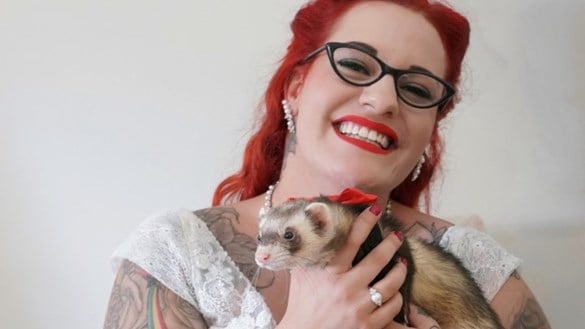 Bride holding ferret